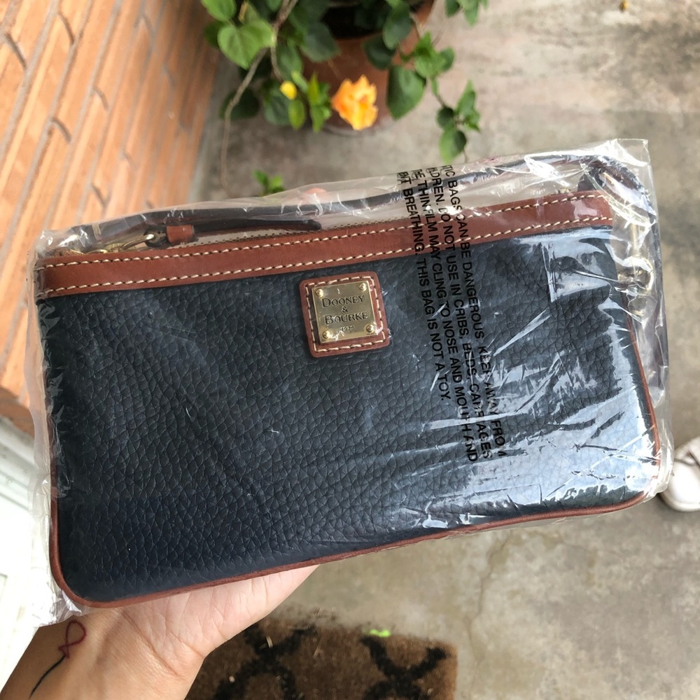dark blue dooney & bourke wristlet